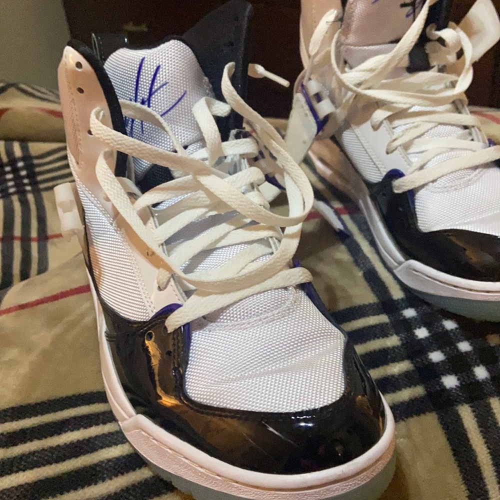 Men’s white/black Jordans